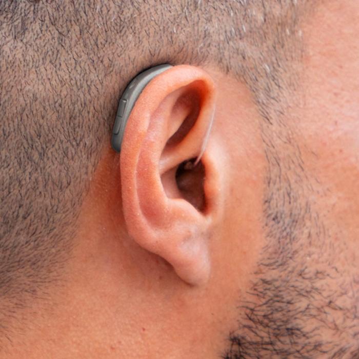 Up close image of Oticon Real hearing aid in ear