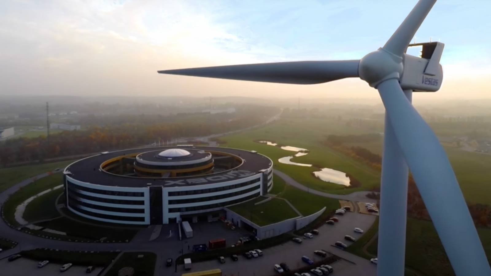 Image of Widex headquarters with wind turbine
