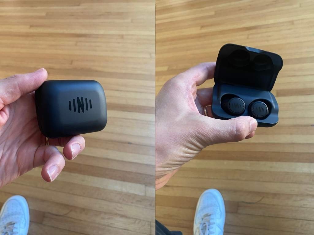 Nuheara earbuds case open and closed during unboxing